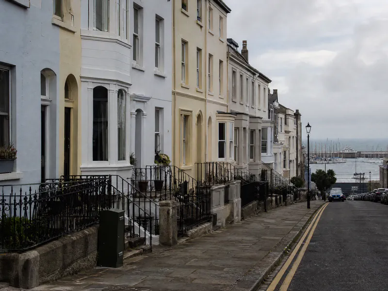 Victorian terrace over basements in Dún Laoghaire with the harbour at the end of the street
